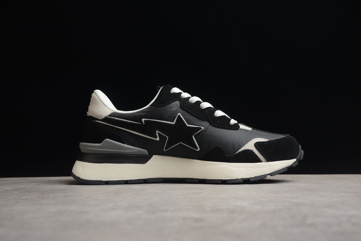 BAPE STA Retro Runner Black and White Sneakers