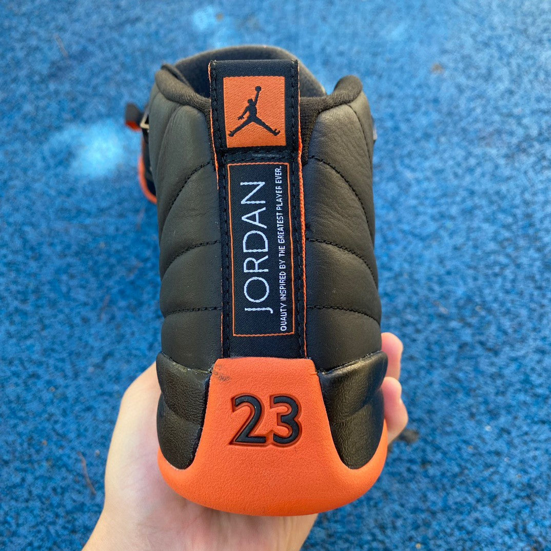 Jordan 12 WMNS “Brilliant Orange”