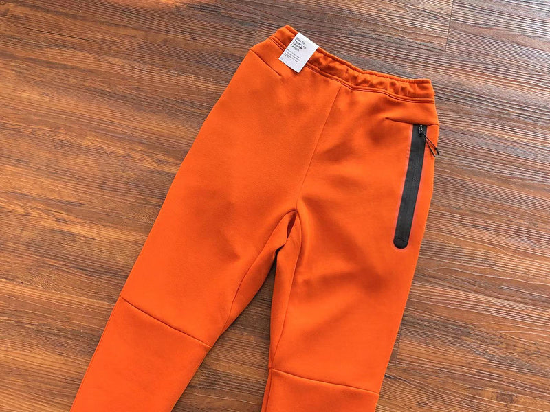 NIKE TECH FLEECE PANTS x CAMPFIRE ORANGE