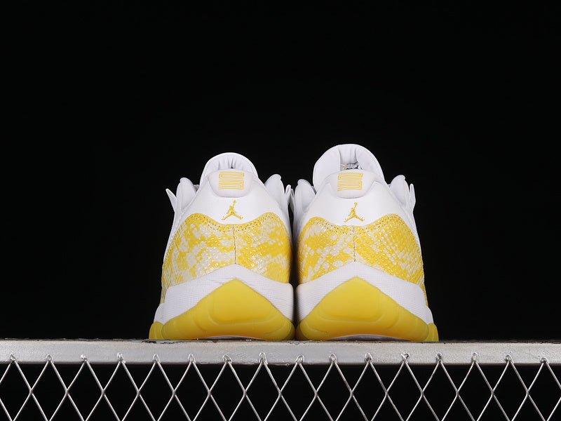 AIR JORDAN 11 RETRO LOW YELLOW SNAKESKIN WHITE