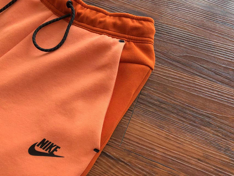 NIKE TECH FLEECE PANTS x CAMPFIRE ORANGE