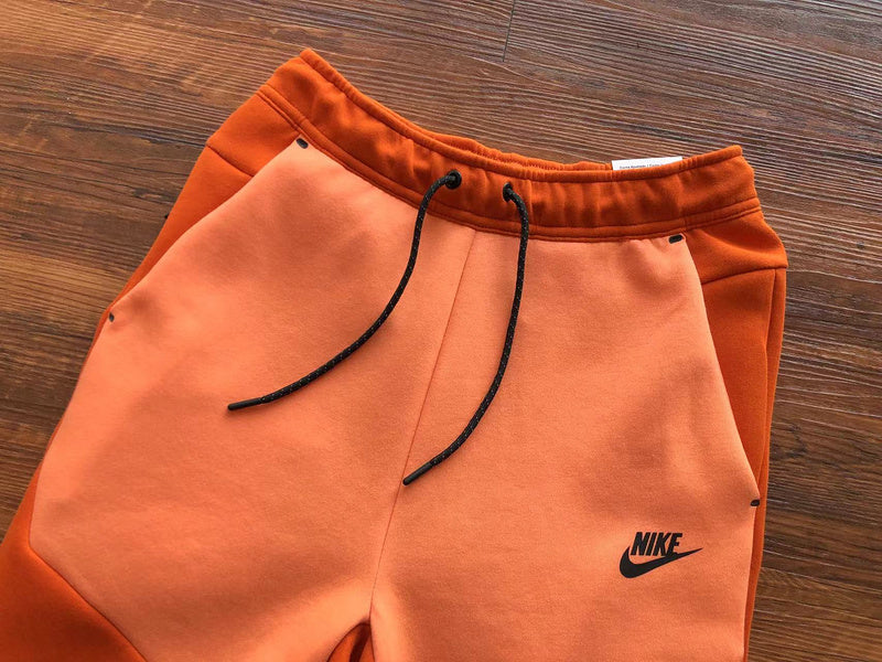 NIKE TECH FLEECE PANTS x CAMPFIRE ORANGE