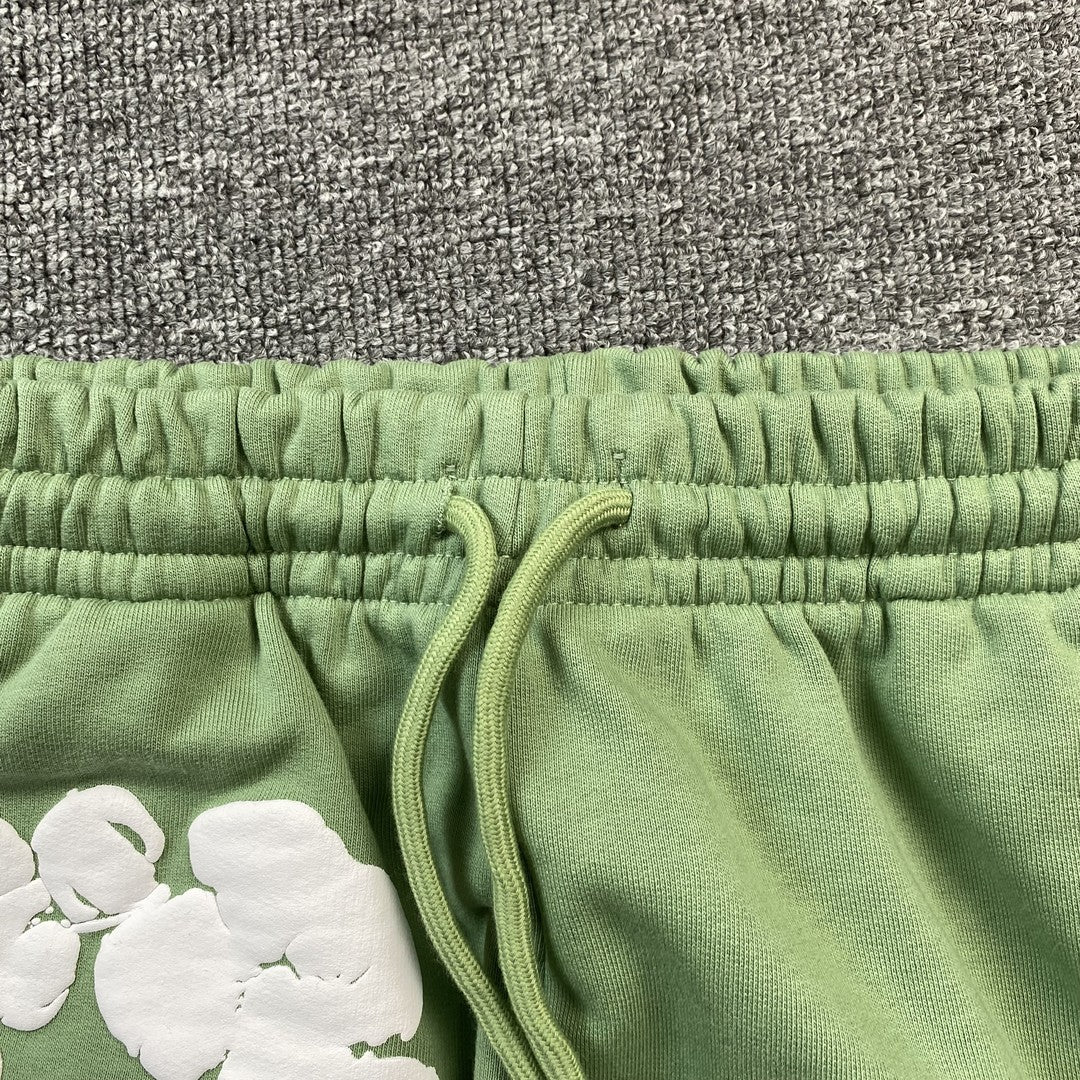 DENIM TEARS COTTON WREATH SWEATPANTS LIGHT GREEN